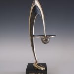 Hole in One Gold Sculpture by Tom Bennett Sculpture
